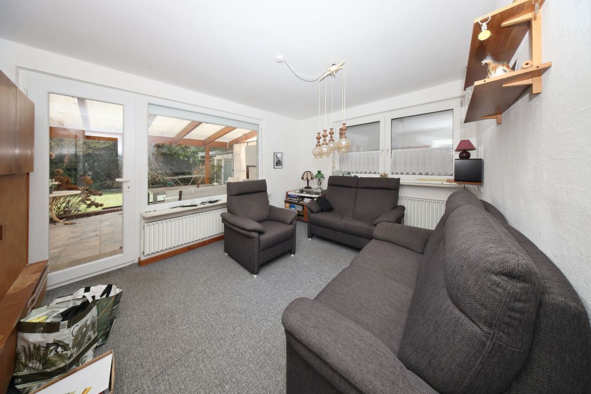 Wohnzimmer mit Zugang zur Terrasse Wohnzimmer mit Zugang zur Terrasse